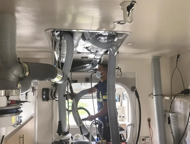 Wayland Air Duct Cleaning specialist performing precise mobile home duct cleaning in Wayland