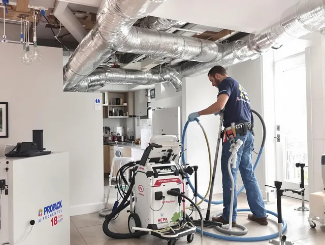Wayland Air Duct Cleaning technician performing advanced pure duct cleaning with specialized equipment in Wayland